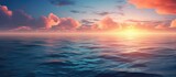 Gorgeous serene scene: Sunset over ocean, with sky, clouds, and water.