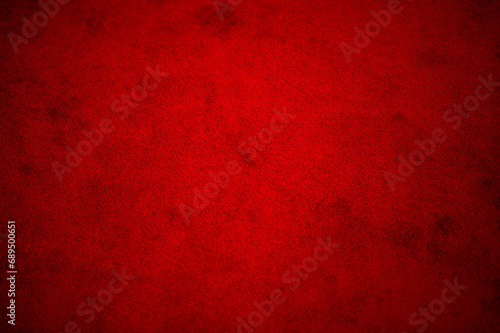 blurred image of red carpet floor, red carpet fabric texture and background seamless photo