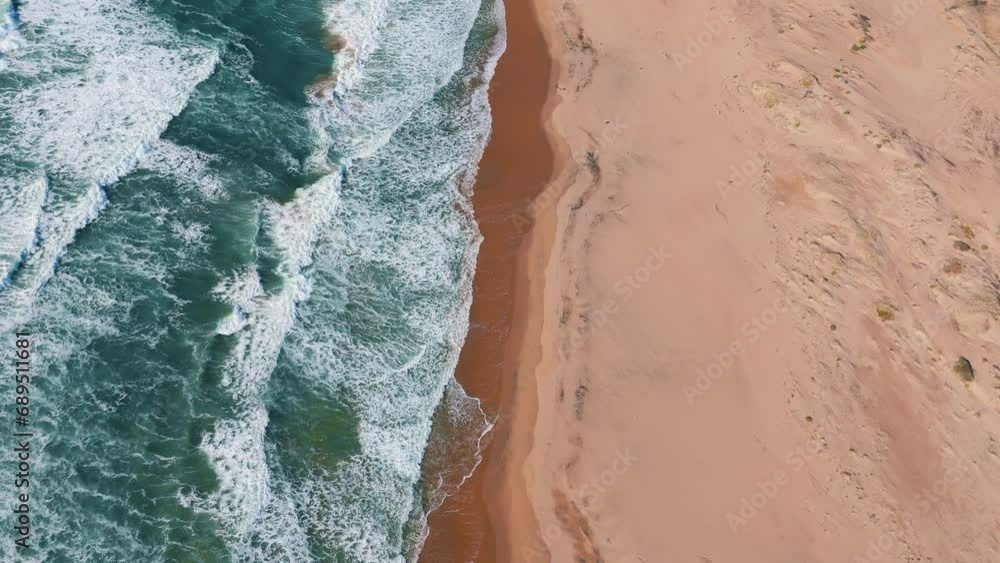 Sandy beach at Big Sur along Highway One in California. Famous road trip route. Slow motion aerial. Sandy beach at Big Sur along Highway One in California. Famous road trip route. Slow motion aerial.