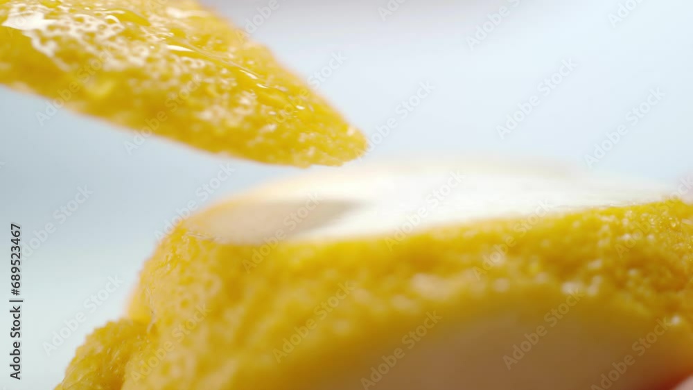 Sharp Knife Slicing Piece from Lemon Surface Sharp Knife Slicing Piece from Lemon Surface