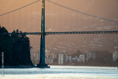Golden Hour Glow on Bridge Over Peaceful Water