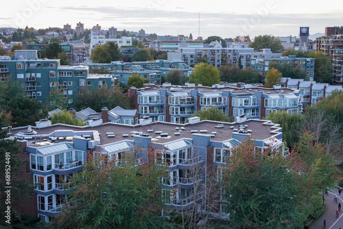 Eco-Friendly Urban Housing Surrounded by Autumn Trees