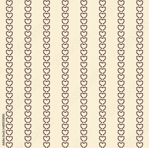 A pattern of small hearts of brown and beige colour on a beige background.