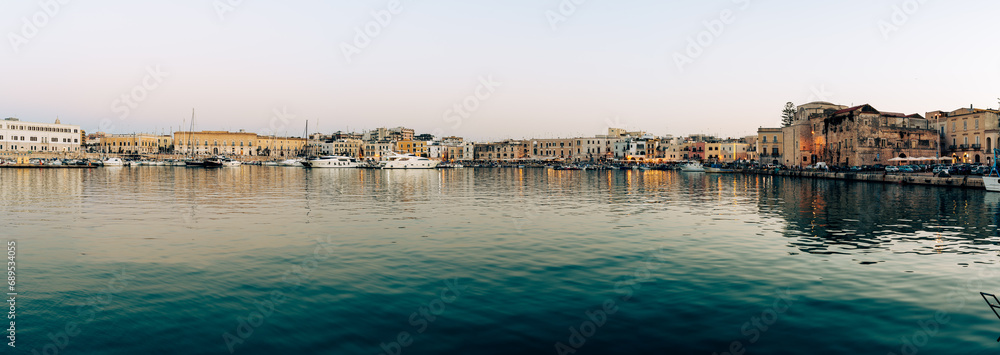 Fototapeta premium panorama of Trani port taken during sunset