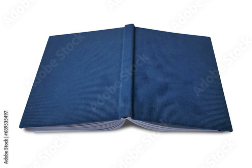 Opened old book facing down on floor, cut out isolated