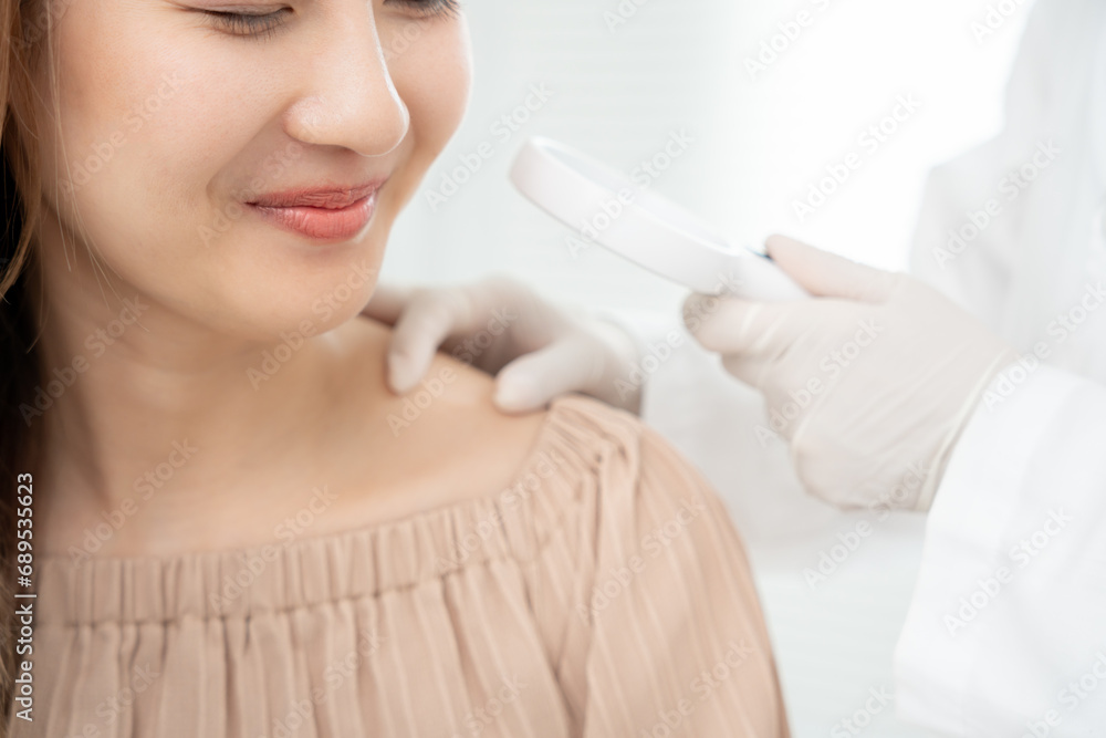 skin problem and beauty. asian woman use magnifying glass look itchy skin from skin allergic, shocked, steroid allergy, sensitive, chemical allergy, rash, insect bites, Seborrheic Dermatitis. skin problem and beauty. asian woman use magnifying glass look itchy skin from skin allergic, shocked, steroid allergy, sensitive, chemical allergy, rash, insect bites, Seborrheic Dermatitis.