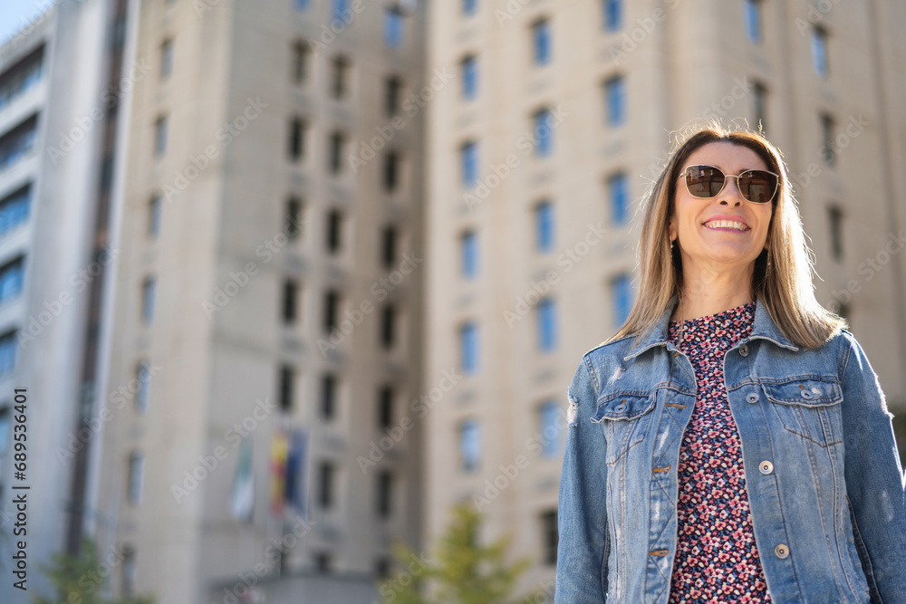 Happy Business Woman Standing Outside A Office Building Happy Business Woman Standing Outside A Office Building