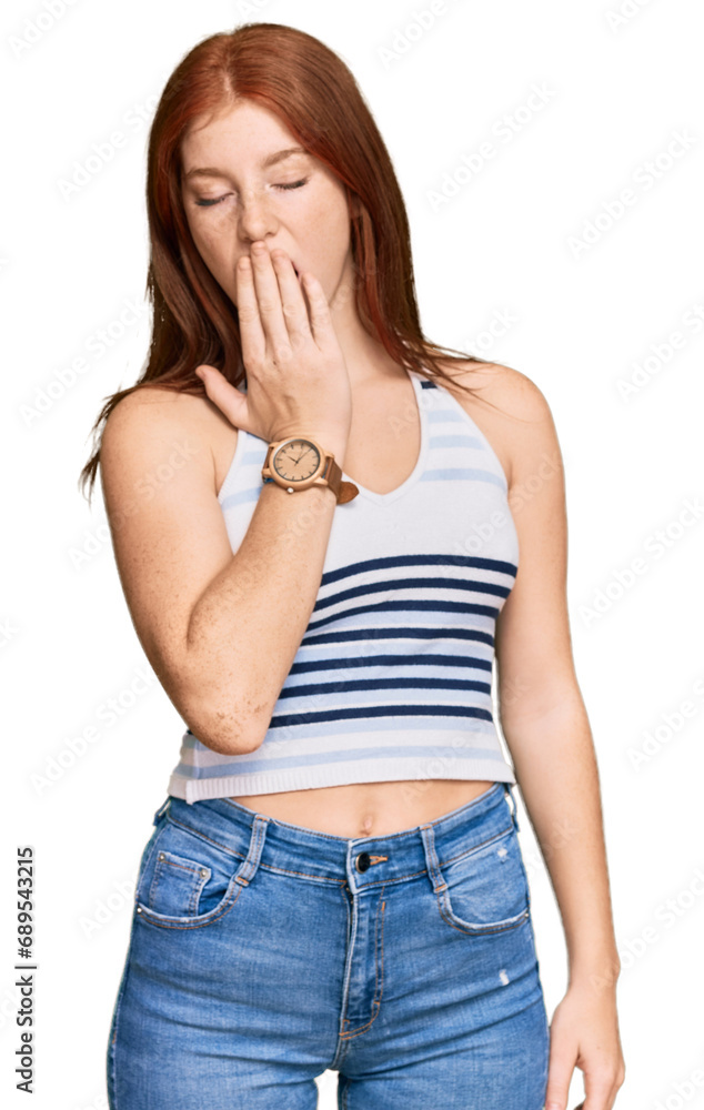 Young read head woman wearing casual clothes bored yawning tired covering mouth with hand. restless and sleepiness. Young read head woman wearing casual clothes bored yawning tired covering mouth with hand. restless and sleepiness.