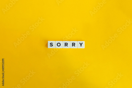 Photography Sorry Word on Block Letter Tiles on Yellow Background