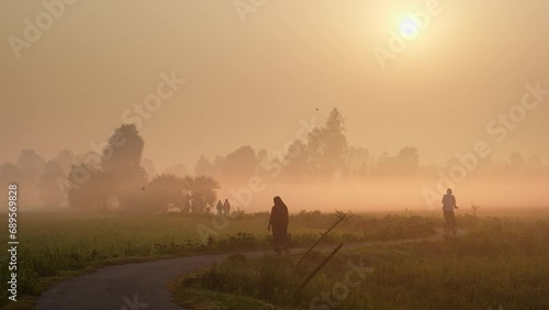 Foggy winter morning video of rural Bangladesh with ambient sound. Serene and picturesque footage for use in videos about nature, travel, and rural life. Biking, cycling, hiking, travel, vacation