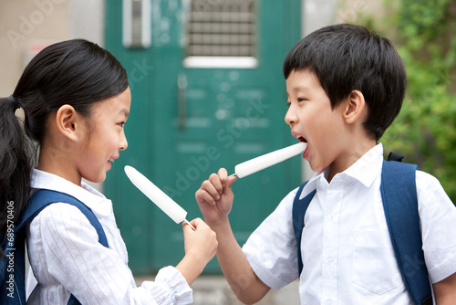 Happy Chinese children with popsicles photo