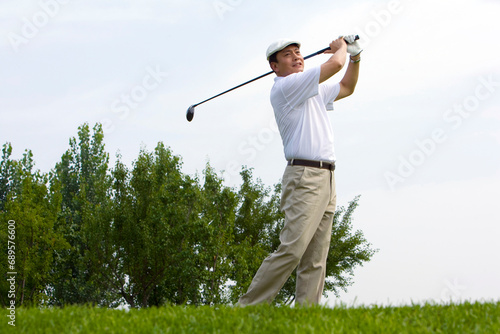 Side View of Golfer's Swing photo
