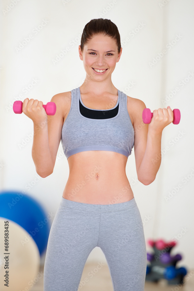 Woman, confident or portrait with dumbbells in gym, health wellness or fitness for weight loss with exercise. Young person, pride or face with hand weights for muscle training results or strong body