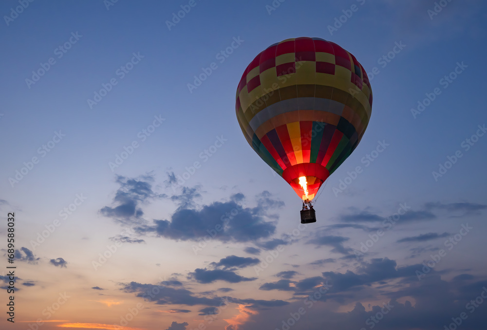 Obraz premium Colorful flying air balloon in sky at sunrise, sunset. Hot air balloon flying.