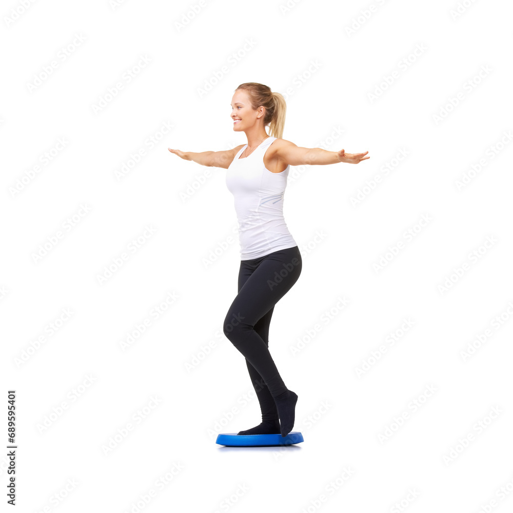 Balance, health and fitness with woman on disk in studio for workout, mindfulness or exercise. Wellness, challenge and training with person on white background for flexibility, smile or aerobics