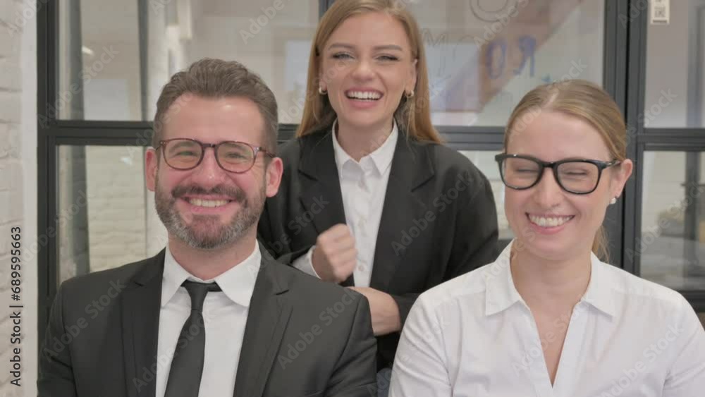 Portrait of Business People Celebrating Success Portrait of Business People Celebrating Success