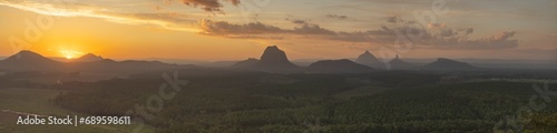 Tourists visit the Wildhorse scenic lookout for sunset panoramic views across the Glasshouse Mountains and the Sunshine Coast in Queensland © hyserb
