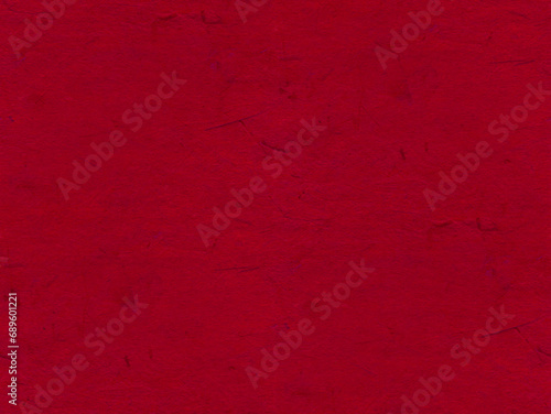 Japanese decorative paper in red tones. Rough surface with many vegetable fibers. Best for collage, bookmaking, hobby, crafts, fine art. Seamless background. 