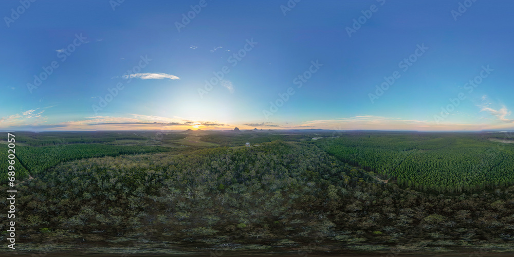 Tourists visit the Wildhorse scenic lookout for sunset panoramic views across the Glasshouse Mountains and the Sunshine Coast in Queensland