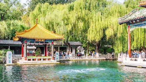 Timelapse photography of Guanlan Pavilion in Baotu Spring, Jinan, Shandong, China photo