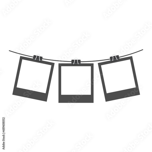 Polaroid photo frame with paper clips