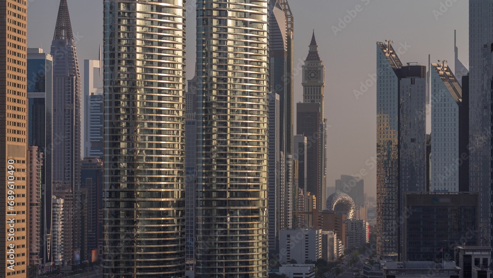 Naklejka premium Dubai International Financial district aerial timelapse during sunrise