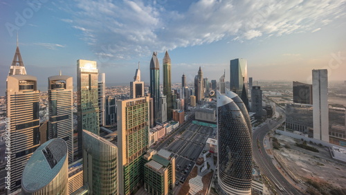 Skyline view of the high-rise buildings on Sheikh Zayed Road in Dubai aerial all day timelapse, UAE. #689610808