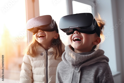 little children, happy to play with virtual reality