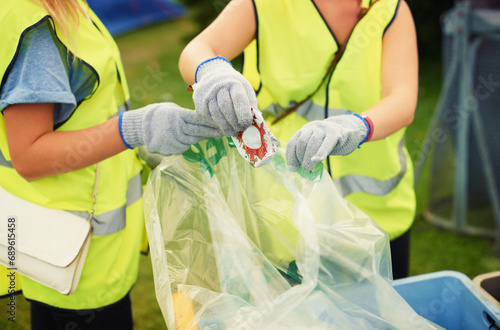 Waste, cleaner and people outdoor with a trash bag to recycle, garbage or beer can at festival. Volunteer, cleaning or hands of janitor with plastic, litter or working at event with junk or rubbish