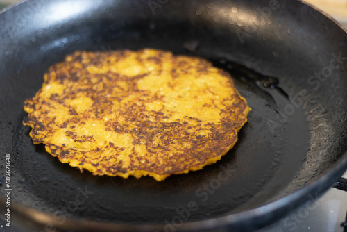 Artisanal preparation of corn cachapas, a typical Venezuelan dish. photo