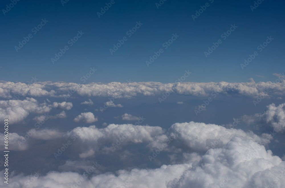 View from an airplane above the clouds