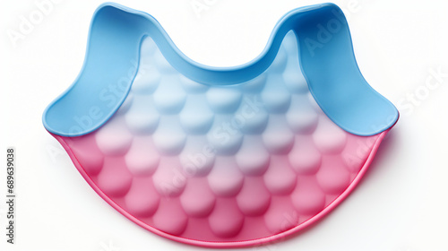 Pink and blue silicone baby bib isolated on white background