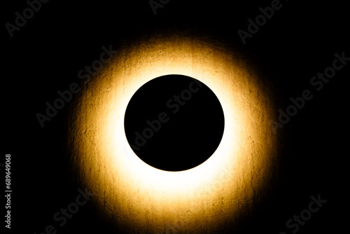 A round wall lamp was shining like a solar eclipse. photo