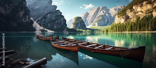 a row of boats on a lake