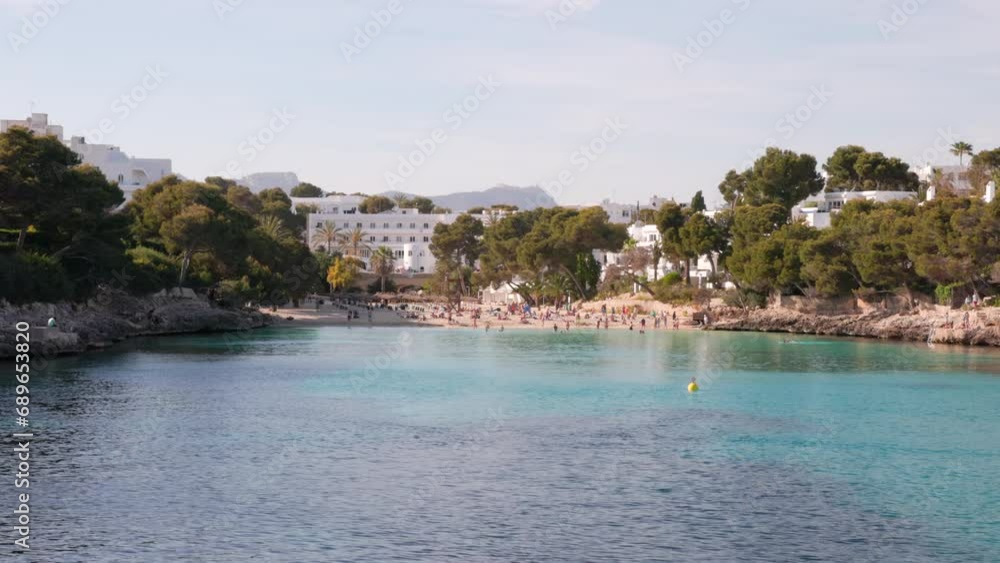 an afternoon shot of cala gran and its sandy beach on mallorca, spain an afternoon shot of cala gran and its sandy beach on mallorca, spain