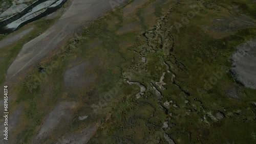 Aerial landscape view of beautiful Deosai plains. A freshwater stream flows through the Deosai National Park Gilgit Baltistan Pakistan.