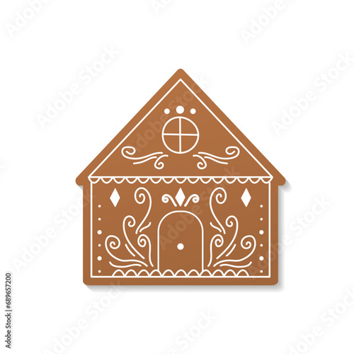 Gingerbread house. Vector hand drawn gingerbread house in a simple flat style. Christmas cookies. Brown and white colors.	