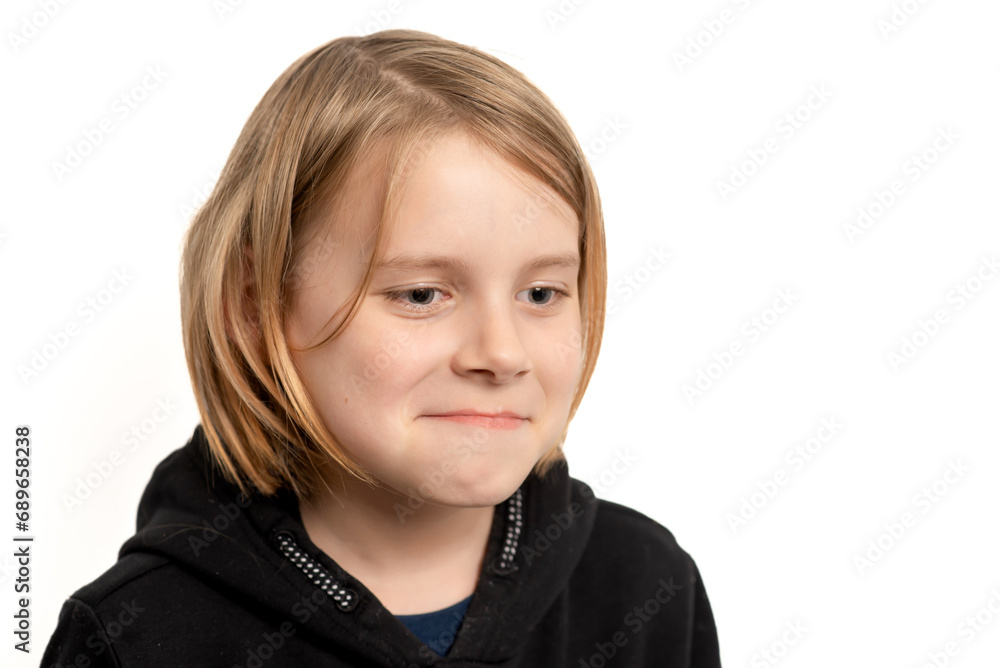 Against the simplicity of a white setting, a ten-year-old boy's portrait radiates with the charm of his long, flowing hair Against the simplicity of a white setting, a ten-year-old boy's portrait radiates with the charm of his long, flowing hair