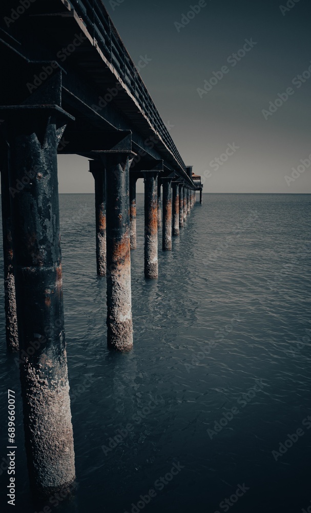 Scenic view of a large pier extending over the ocean in Gulf Street, Kuwait Scenic view of a large pier extending over the ocean in Gulf Street, Kuwait