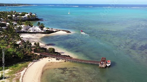 Aerial view of luxury resort Shangri-La Le Touessro in the afternoon with private jetty and ferry, Flacq, Mauritius. photo
