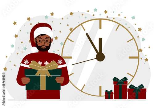 A man in a red sweater and a red cap with a large gift box. 5 minutes before Christmas or New Year.