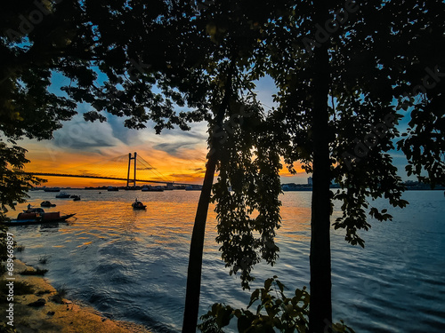 Kolkata river ganga view during sunset photo