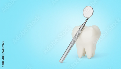 Tooth and dental mirror. Blue background. Copy space. 3d render