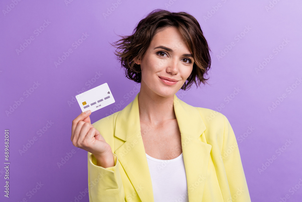 Photo of charming girl financial marketing modern fast transaction visa worldwide plastic credit card isolated on violet color background Photo of charming girl financial marketing modern fast transaction visa worldwide plastic credit card isolated on violet color background