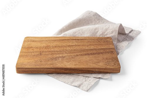 Wood plate on linen napkin isolated on white background