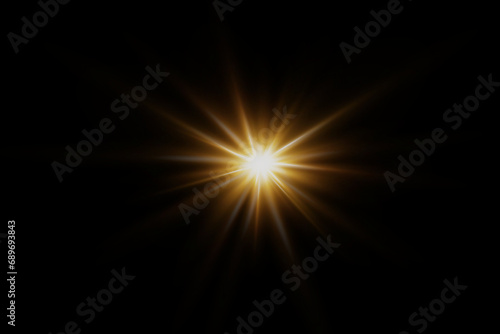 Fototapeta Naklejka Na Ścianę i Meble -  Light effect star flashed. Glare of light and flash. On a black background.