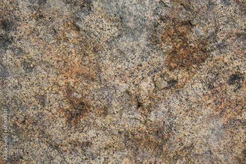 Red brown rock natural texture for background. Close up cracked mountain surface.