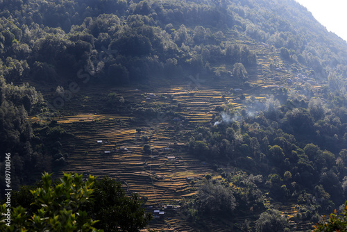 the valley and village of Birethanti in Nepal, view of Poonhill circle trekking photo