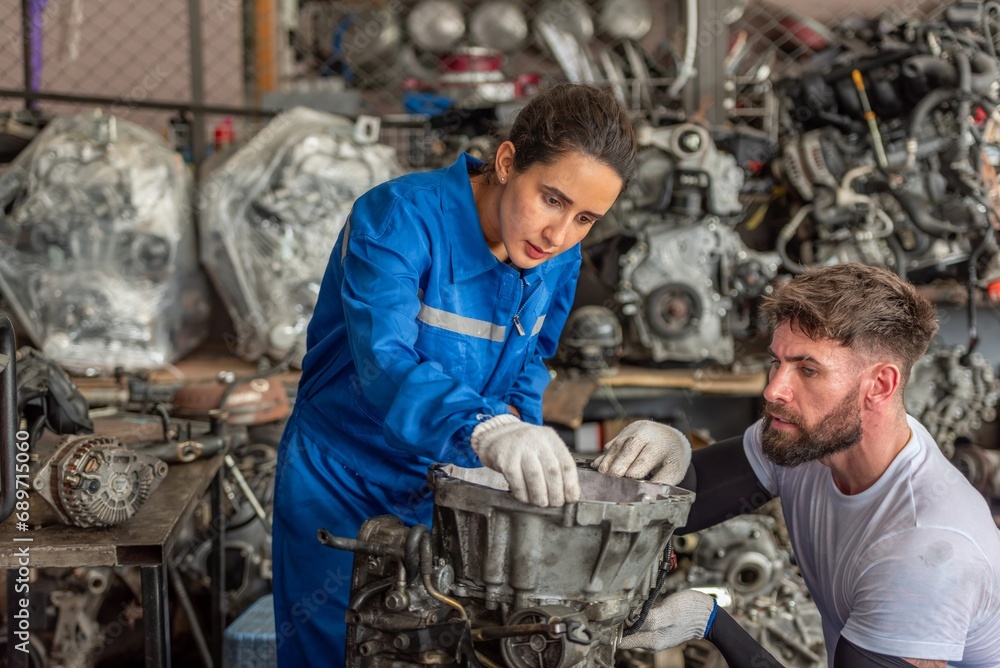 auto two professional mechanical technician garage motor car engine team check automobile engine for diagnostic maintain transmission machine. technician worker auto in garage check engine car motor auto two professional mechanical technician garage motor car engine team check automobile engine for diagnostic maintain transmission machine. technician worker auto in garage check engine car motor