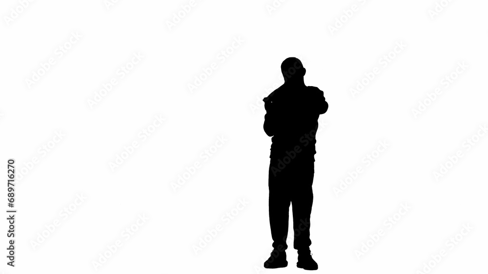 Portrait of kid boy isolated on white background with alpha channel. Silhouette of schoolboy standing posing with skateboard looking at camera.